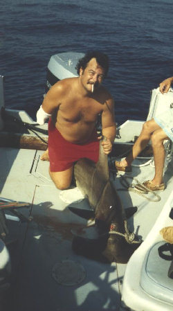 Al Brenneka and a hammerhead shark he killed 